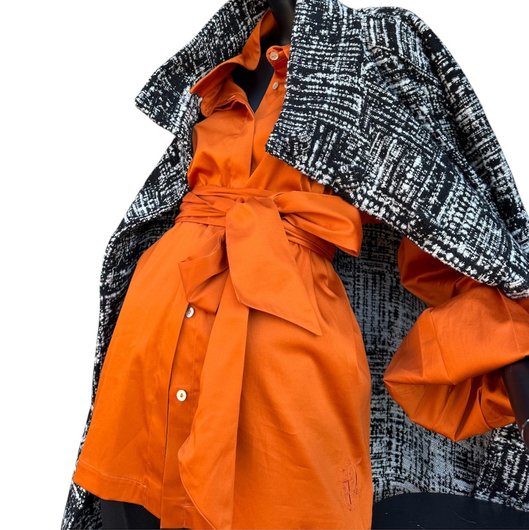 Blouse longue à plis avec ceinture